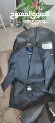  7 Two suits with two long sleeve shirt