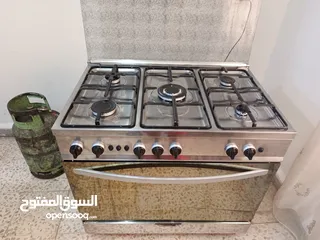  4 غاز تكنو ستانلس 5 عيون 6 مفاتيح مروحة توزيع حرارة و تبريد بالفرن قدحة و امان بالفرن شغال100% منفوض