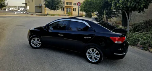  14 كيا فورتي فل مع فتحه سقف وبصمه 2011 اصل برايفت