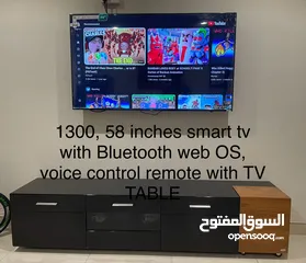  1 Smart TV With Bluetooth , Web OS and voice control remote 58 inches smart tv 2 months used only