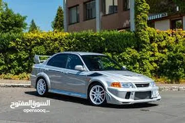  2 مطلوب mitsubishi evolution اصلية غير محولة