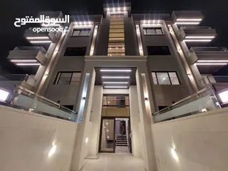  3 شقة فاخرة جديدة خلف الجامعة الاردنية 210م -  العمارة مرتفعة اطلالة جميلة