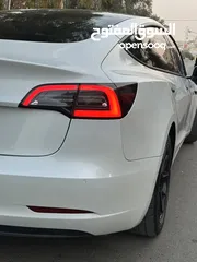 13 تسلا موديل 3 لون أبيض لؤلؤي 2022 Tesla model 3 . 2022