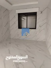  18 شقة أرضية فاخرة للبيع في خلدا - قرب إشارة البنك العربي 145م مع حديقة وترسات 120م لم تسكن