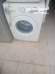  1 Samsung front door washing and dryer machine