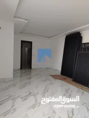  2 شقة أرضية فاخرة للبيع في خلدا  - خلف المستشفى السعودي 330م مع حديقة وترسات 100م لم تسكن