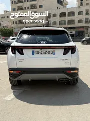  14 هونداي توسان ترخيص 2022 محرك 1600 هايبرد plug in/يقطع على الشحنه 52 كيلو متر