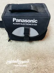  6 Panasonic camera with bag