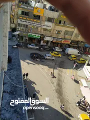  1 الدوار /مقابل التل الاخضر مجمع الحواري التجاري