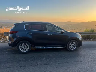  3 كيا سبورتاج 2016. مطور 1700