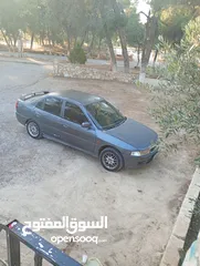  1 ميتسوبيشي لانسر 99