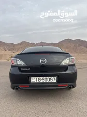  11 لون اسود ملوكي وارد خليجي Mazda zoom 6 2011