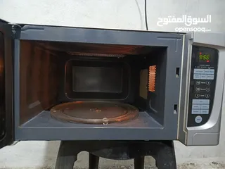  5 ميكرويف كونتي لون سلفر 42لتر من جوا تيفال مع نظام شواي داخليه فخم جدا تب نظافه قابل للتفاوض