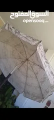  2 مظله من إيكيا ثقيله قاعدتها حديد ومرجيحه 3 مقاعد بفرش او بدون