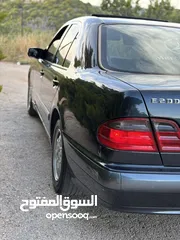  25 E200. 2002  قرش ونص 2002  رقم الهاتف بالوصف