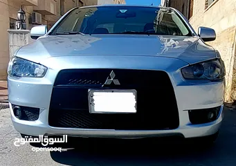  4 ميتسوبيشي لانسر 2014 بحال الوكالة