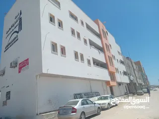  3 مبنى اربع طوابق تشطيب حديث يطل مباشرة على طريق مزدوج قصر أحمد