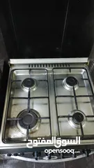  2 cooking range with oven and gas cylinder