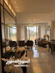  4 شقة بموقع مميز في عين منجد للبيع