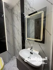  15 شقة بتشطيبات مميزه طابق ارضي مساحة 240م باجمل منطاق خلدا (مشروع 107)