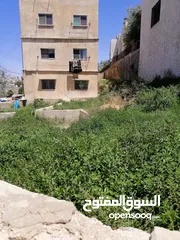  5 عماره مع ارض للبيع تصلح للاستثمار او اسكان
