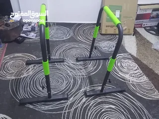  1 عقلة حائط تستحمل وزن 150+متوازي أرض يستحمل وزن 120+دامبلز وزن 25 للبيع كلهم