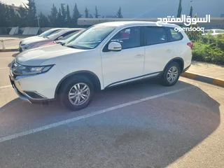  10 ميتسوبيشي أوتلاندر موديل 2018 (قابل للبدل) لون ابيض، دفع رباعي، فحص كامل ومرخصة حديثا لغاية 4/4/2026