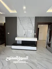  15 بالاقساط طابق ثالث مع روف في طريق المطار  تشطيب فندقي مع فير بليس و جاكوزي