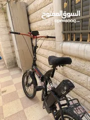  1 بسكليت عجل رفيع عليها صنبرص وسط وامامي