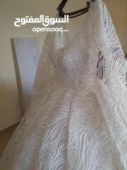  1 فستان زفاف جديد استعمال مرة واحدة فقط للبيع بسعر مغري