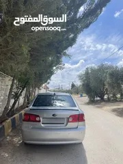  21 كيا لوتزي 2006 3 جيد لون سلفر ماتور 2000cc