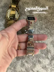  4 Michael Kors and Armani Exchange Women’s watches. Used but in good condition.