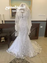  5 فستان عرس راقي موديل سمكة مع طرحة