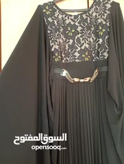  1 بشت قطعتين لبسة واحدة جميل جدا وراقي ع اللبس لونه برتقالي السعر*12 دنانير بتلبس وزن 100ك