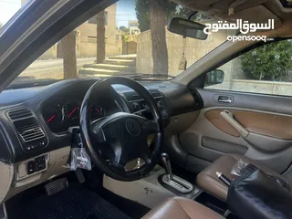  6 هوندا سيفيك 2002محدثه 2005 فل كامل جير اتوماتيك