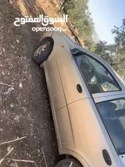  2 سياره دايو كالوس 2002بحاجهً لماتور فقط وبترجع احسن من اول