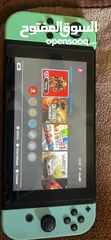  7 NINTENDO SWITCH 512 GB WITH 9 GAMES