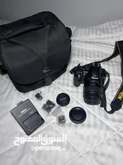  5 كاميرا نيكون ( Nikon ) D3100