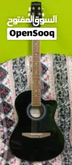  1 Carlos Guitar best new good condition less used