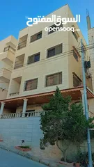  2 بناية مكونة من اربع طوابق /الزرقاء جبل طارق