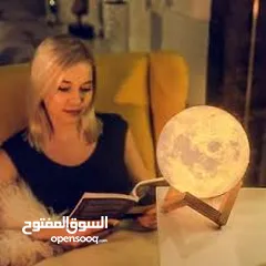  2 سماعه  القمر المضيئ مع القاعده وريموت و بلوتوث