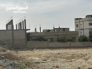  1 قطعة ارض للبيع واجهة عشارع رئيسي