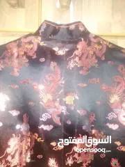  3 فستان اسود موديل صيني مطرز مصنوع من قماش الساتان الناعم مناسب للسهرة او للعيد..... جديد غير مستعمل