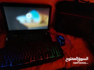  1 Dell Laptop with x-trike RGB gaming mouse and rainbow gaming keyboard with bag and mouse pad