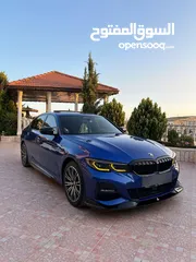  5 BMW 330e /// M Package