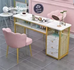  3 طاولة العروس الذهبية ذات تاثير رخامي يوجد على جانب الطاولة ادراج للاخزين وجميع انواع اعمال الاظافر