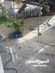  20 شقة ارضية للبيع بجبل الحسين ، شارع يافا ، عمارة 82 ، شقة 1 مع ترس وكراج سيارة