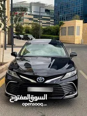  1 تويوتا كامري 2021 فل كامل مع فتحة فحص كامل 7 جيد كرت ابيض بحالة الشركة
