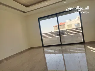  19 شقة فاخرة مع روف الجبيهة ضاحية الرشيد قرب دوار الجاذبية 180م مع روف غير مبني اطلالة رائعة جدا