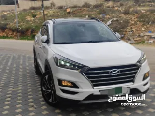  6 هونداي توسان بنزين فل مسكر اضافات دفع رباعي جيب بالكرتونة قطارة بالمصروف